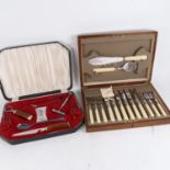 An Edwardian walnut-cased canteen of fish cutlery for 6 people, including servers, and a part Viners