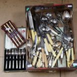 A box of mixed plated cutlery, including ivorine-handled