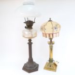 A Victorian oil lamp, with moulded glass font, height 75cm, and a brass Corinthian column electric