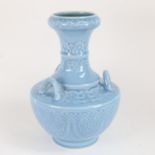 A Chinese duck egg blue ceramic garlic neck vase, modelled as a basket with ring handles, and 6