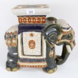 An Oriental glazed ceramic elephant garden seat, height 37cm