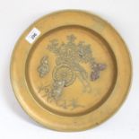 A Japanese brass charger, engraved and applied boy decoration, with 4 character mark on base,