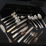 A group of silver teaspoons, pickle forks, 4 silver-bladed knives, 8.8 weighable ounces