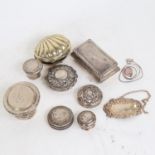 A group of silver items, to include scent bottle lids, wine decanter, and a small rectangular box