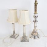 A pair of silver plated Corinthian column candlesticks converted to electric, and a single plated