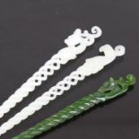 A group of 3 Chinese carved and polished jade spiral hair ornaments, with dragon and phoenix