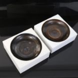 A pair of Troika ceramic dishes, artist's marks of Penny Black, 12cm x 12cm