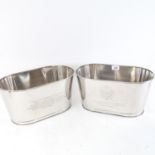 A pair of medium electroplate wine coolers, length 35cm