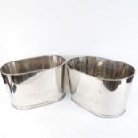 A pair of large electroplate wine coolers, length 43cm