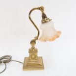 A brass adjustable desk lamp, by Christopher Wray, with glass shade, height 40.5cm