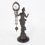 A reproduction mystery clock in Art Nouveau style, overall height 34cm