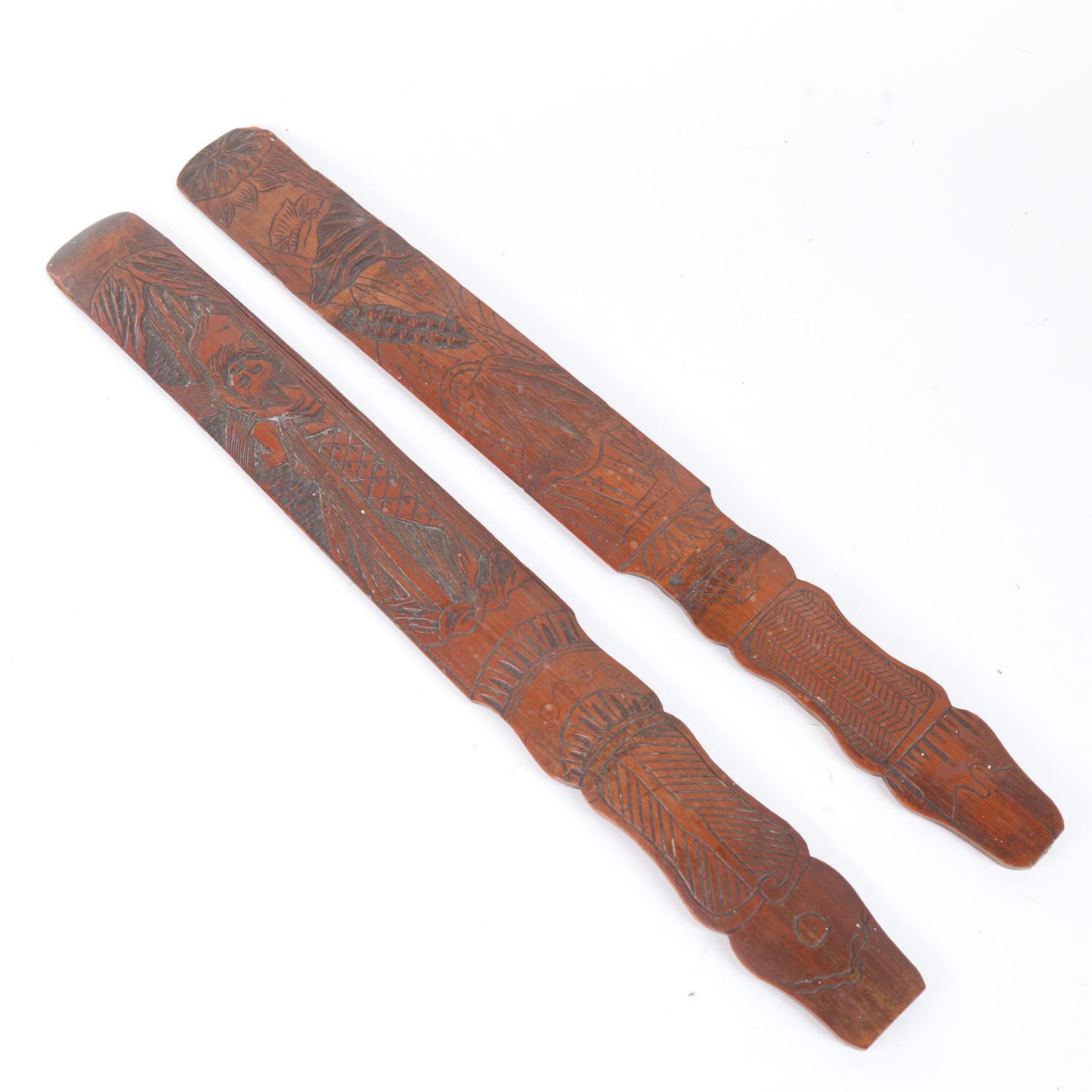 2 Chinese carved bamboo page turners, largest length 45cm