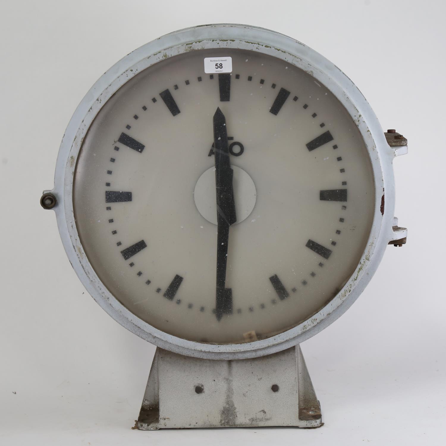 A Vintage French double-sided railway station clock, by ATO, diameter49cm, height 60cm