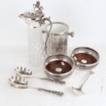 A moulded glass Claret jug, with plated mounts and rampant lion finial, a pair of wine coasters,