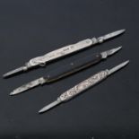 A silver Sampson Mordan & Co penknife, a Continental silver penknife, and another (3)