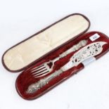 A Victorian embossed silver plated fish slice and fork, cased