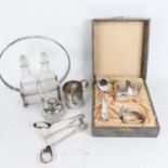 A silver-mounted inkwell, a Continental silver spoon and pusher, oil jar set in plated stand, and