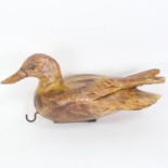 A Vintage painted wood decoy duck, stamped G Gallagher, length 28cm