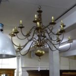 A Dutch brass 16 branch chandelier