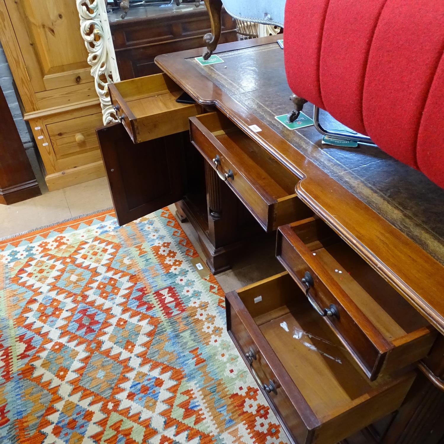 A reproduction mahogany partner's writing desk, with a tooled brown leather skiver, 6 frieze - Image 2 of 2