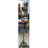 A Victorian brass telescopic oil lamp converted to electric, on claw feet