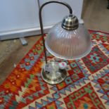 A brass effect desk lamp with glass shade, height 50cm