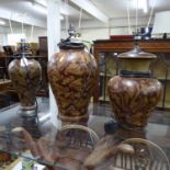 3 similar terracotta table lamps and shades, with acanthus leaf decoration, by The Red Mud Company