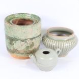 A small Chinese celadon glaze water pot, height 6.5cm, a ribbed celadon glaze small jardiniere,