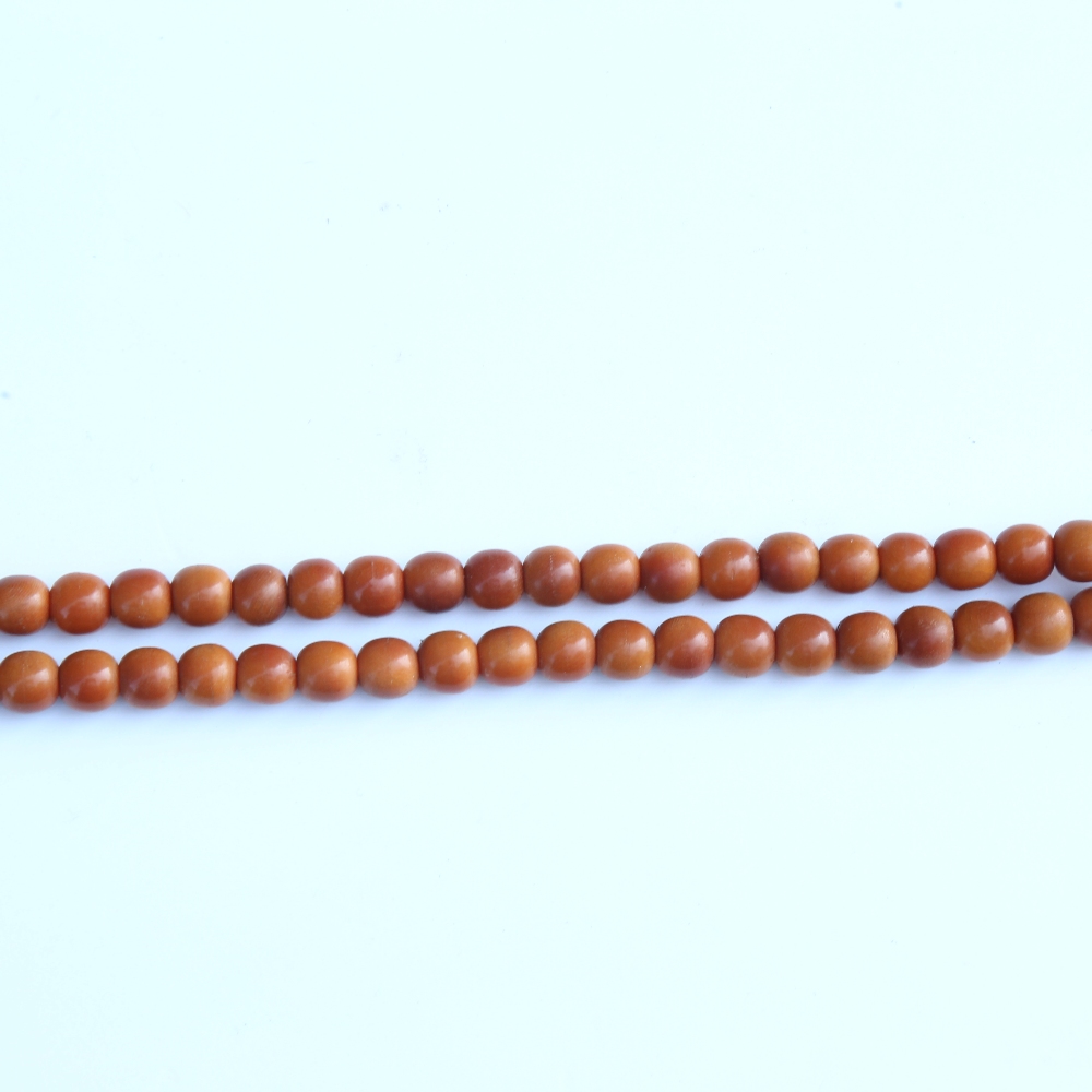 A string of honey coloured natural horn beads, possibly rhino horn - Image 8 of 20