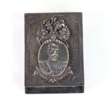 An early/mid 20th century Russian 84 zolotnik standard silver matchbox holder, with portrait of Czar