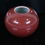 A Chinese sang de boeuf glaze porcelain miniature brush pot, seal mark, diameter 7cm