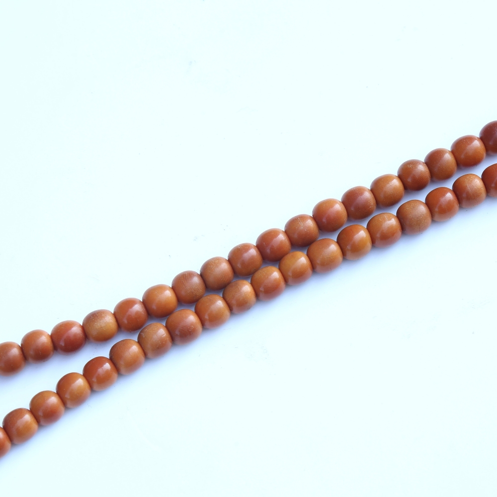 A string of honey coloured natural horn beads, possibly rhino horn - Image 4 of 20