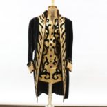 A velvet and gold leather-mounted long coat and matching waistcoat
