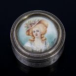 A French silver miniature portrait pillbox, circular form with allover engine turned decoration