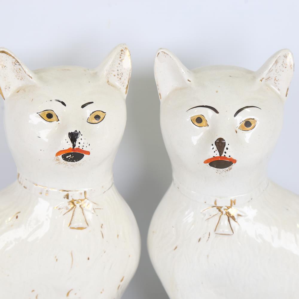 A rare pair of 19th century Staffordshire Pottery seated cats, height 34cm No chips cracks or - Image 2 of 3