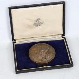 A large 19th century relief cast bronze prize medallion, diameter 7.5cm