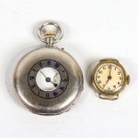 A silver-cased half hunter side-wind pocket watch, white enamel dial with Roman numeral hour markers