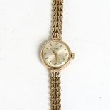 TUDOR - a lady's Vintage 9ct gold Royal mechanical bracelet watch, silvered dial with quarterly gilt