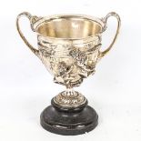 A 19th century electroplate 2-handled chalice, with high relief cast Classical figures on marble