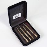 A set of 4 Antique sterling silver Bridge propelling pencils, engine turned decoration, length 9cm