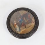 A 19th century tortoiseshell snuffbox of circular form, hand painted central panel depicting dancers