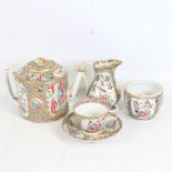 A group of Chinese Canton enamel porcelain teaware, hand painted and gilded decoration, comprising