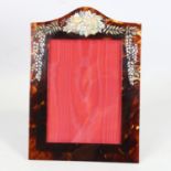 A tortoiseshell and Shibayama photo frame, late 19th century, with relief carved and applied