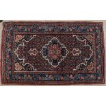 An antique Kurdish Vegetable dye rug, 202cm x 231cm