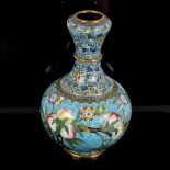 A Chinese cloisonne enamel garlic-neck vase with prunus design, height 25cm