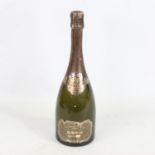 A bottle of Krug Champagne, vintage 1976 From local cellar. Some sc uffs to label and capsule