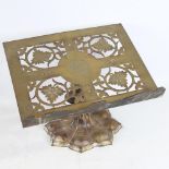 A Victorian brass lectern, pierced and engraved brass panels on leaf design pedestal, width 36cm