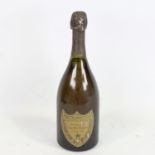 A bottle of Cuvee Dom Perignon Champagne, vintage 1976 From local cellar. Scuffs to label and