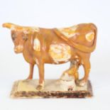 19th century Whieldon glaze pottery milkmaid and cow, length 16cm