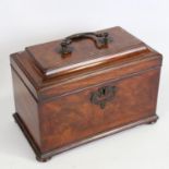 A George III mahogany tea caddy, with brass carrying handle and secret drawer in the base, length